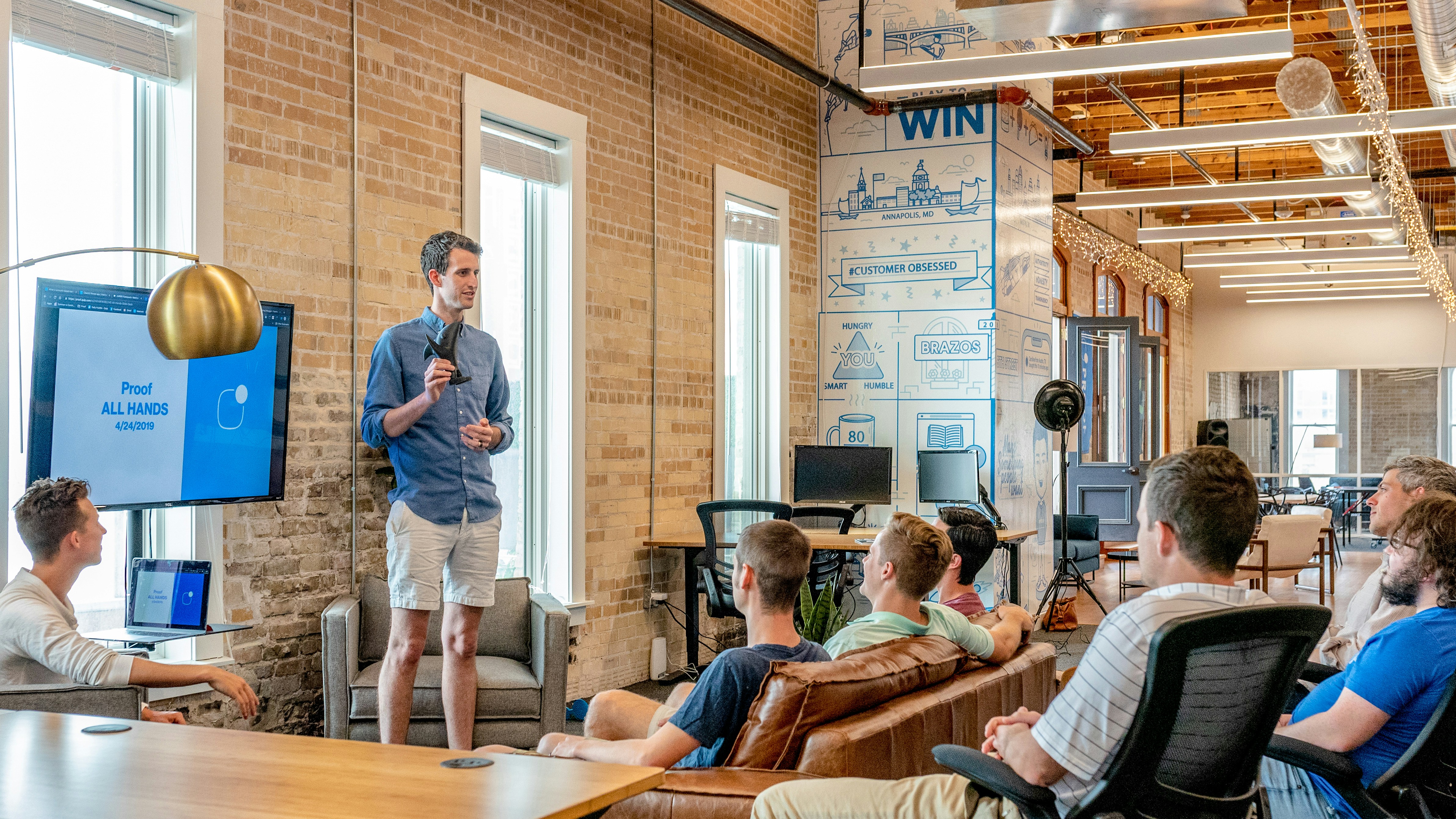 A startup team in an all-hands meeting